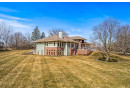 W297N1885 Glen Cove Rd, Delafield, WI 53072 by Compass RE WI-Lake Country $980,000