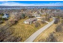 W297N1885 Glen Cove Rd, Delafield, WI 53072 by Compass RE WI-Lake Country $980,000