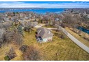 W297N1885 Glen Cove Rd, Delafield, WI 53072 by Compass RE WI-Lake Country $980,000