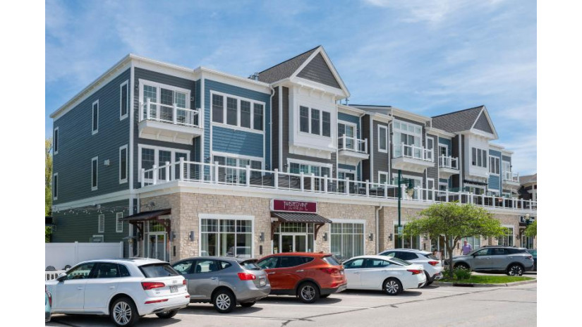 145 W Wisconsin Ave 1 Pewaukee, WI 53072 by Compass RE WI-Lake Country $1,695,000