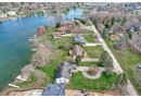 W355N4971 Lakeview Ct, Oconomowoc, WI 53066 by The Real Estate Company Lake & Country $1,449,000