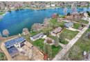 W355N4971 Lakeview Ct, Oconomowoc, WI 53066 by The Real Estate Company Lake & Country $1,449,000