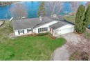 W355N4971 Lakeview Ct, Oconomowoc, WI 53066 by The Real Estate Company Lake & Country $1,449,000