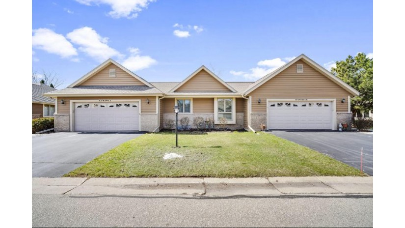 N24W24045 Brandon Oaks Dr B Pewaukee, WI 53072 by RE/MAX Service First $329,900