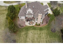 2175 Coachmen Ct, Delafield, WI 53018 by Keller Williams Realty-Lake Country $1,500,000