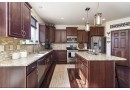 1411 Prairie Creek Blvd, Oconomowoc, WI 53066 by Berkshire Hathaway HomeService True Realty $639,900