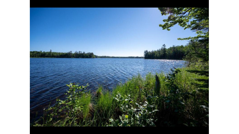 163-165 Clearwater Lake Tr Eagle River, WI 54521 by Gold Bar Realty $1,000,000