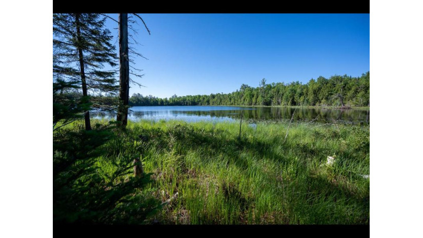 163-165 Clearwater Lake Tr Eagle River, WI 54521 by Gold Bar Realty $1,000,000