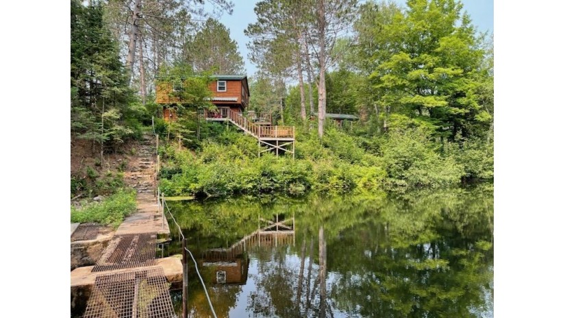 W2335 Wedlers Pond Rd Russell, WI 54435 by Redman Realty Group, Llc $795,000