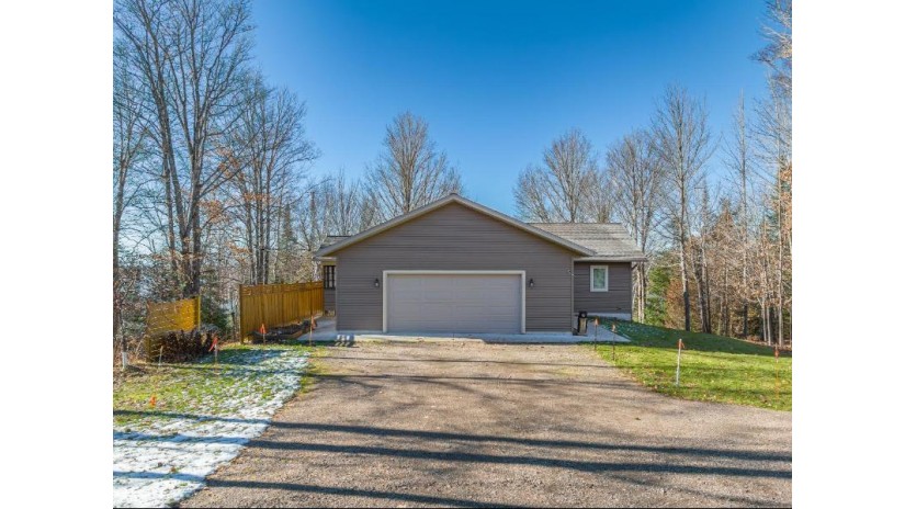 13231 Charly Ln Winchester, WI 54557 by Redman Realty Group, Llc $747,000