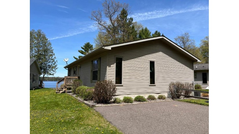 8257 Maplewood Ln Eagle River, WI 54521 by Re/Max Property Pros $695,000