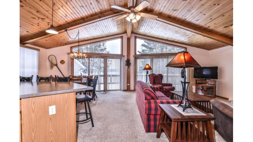 8257 Maplewood Ln Eagle River, WI 54521 by Re/Max Property Pros $695,000