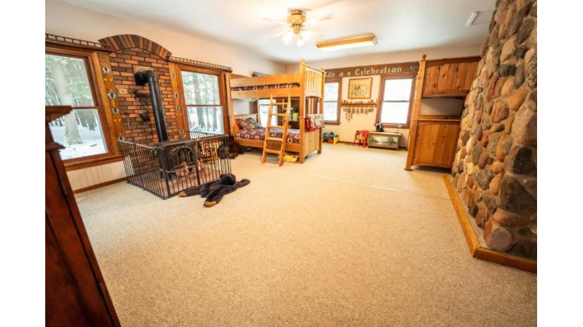 7533 Rustic Ln Eagle River, WI 54521 by Pine Point Realty $575,000