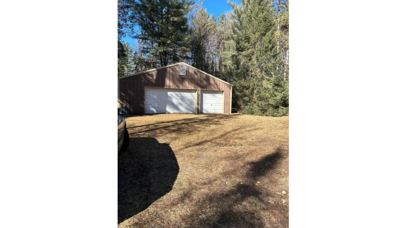 7533 Rustic Ln Eagle River, WI 54521 by Pine Point Realty $575,000