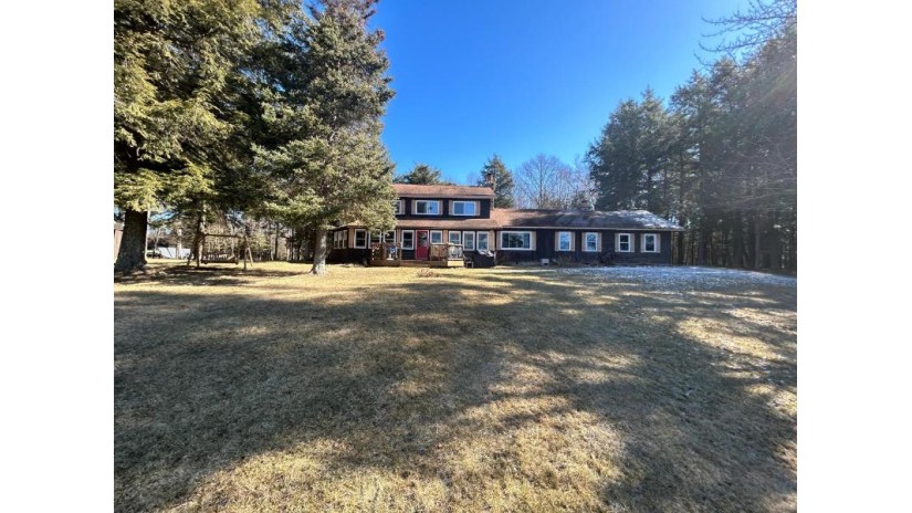 7533 Rustic Ln Eagle River, WI 54521 by Pine Point Realty $575,000