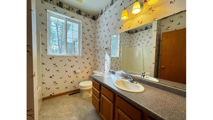 7460 Hidden Trail Minocqua, WI 54548 by Redman Realty Group, Llc $389,900