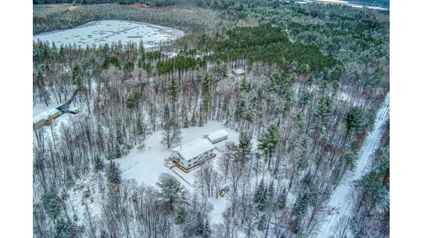 4723 Loggers Run Rd Eagle River, WI 54521 by Redman Realty Group, Llc $499,900