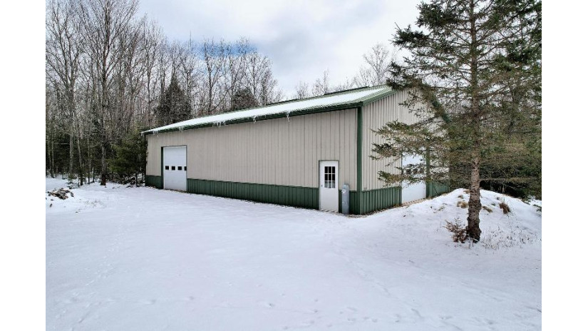 5085 Cooper Ln Sugar Camp, WI 54521 by Eliason Realty - St Germain $495,000