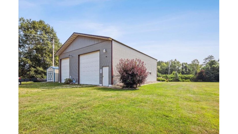 N6730 Balsam Row Road Wescott, WI 54166 by RE/MAX North Winds Realty, LLC $460,000