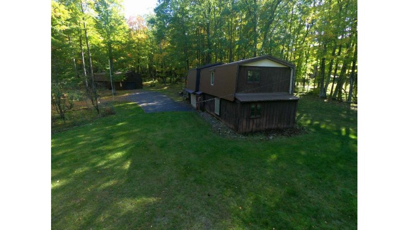 W9823 Miscauno Island Lane Holmes, MI 49821 by Coldwell Banker Real Estate Group $184,900