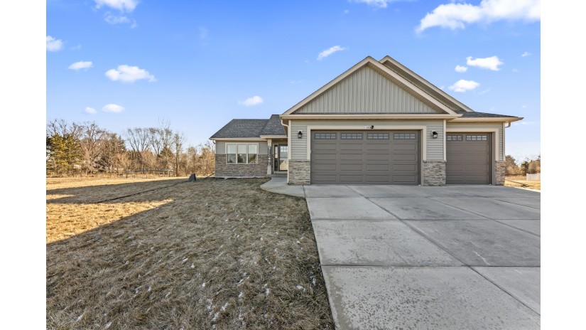 W188 Thompson Cir Ixonia, WI 53066 by Shorewest Realtors $449,900