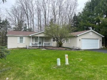 7635 Sunset Shores Drive Canadian Lakes, MI 49346