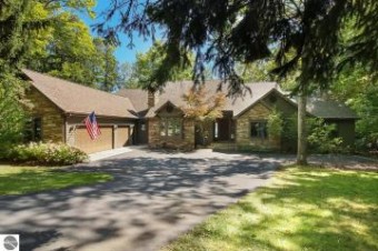 225 N Torch Lake Drive, N Kewadin, MI 49648