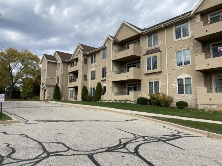 2912 N University Ct 303B Waukesha, WI 53188-1494 by First Weber Real Estate $219,900