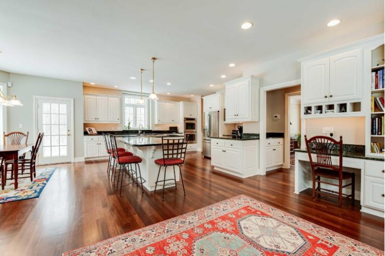 9741 N Columbia Creek Ln Mequon, WI 53092-5658 by First Weber Real Estate $899,900