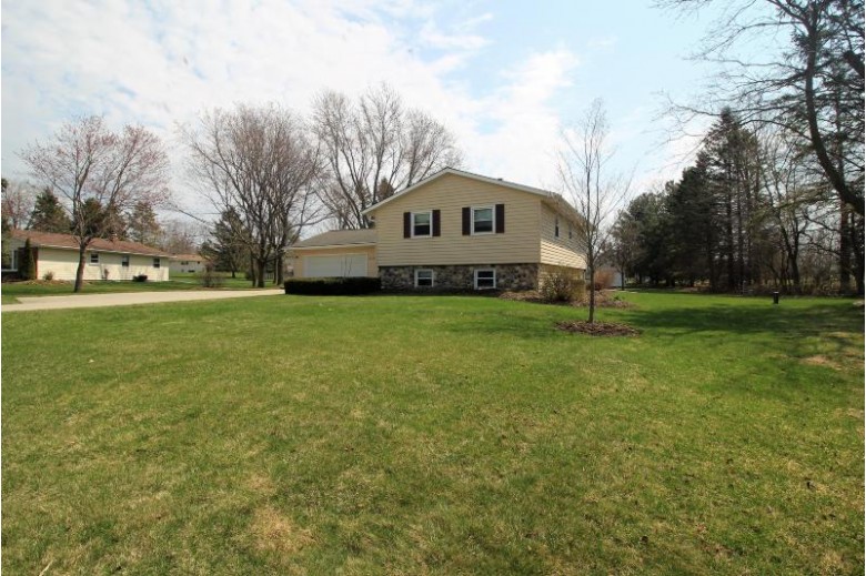 4897 Lois Ln, West Bend, WI by Redefined Realty Advisors Llc $349,900