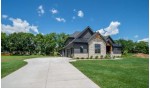 5786 Derby Downs Dr, Waunakee, WI by First Weber Real Estate $999,900