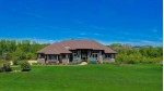 N77W23616 Sun Valley Run Sussex, WI 53089-5308 by First Weber Real Estate $624,500