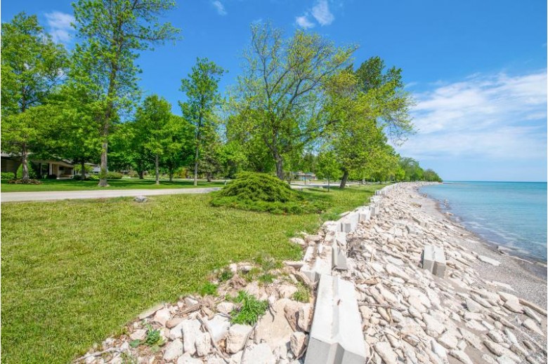7415 N Beach Dr, Fox Point, WI by Keller Williams Realty-Milwaukee North Shore $999,000