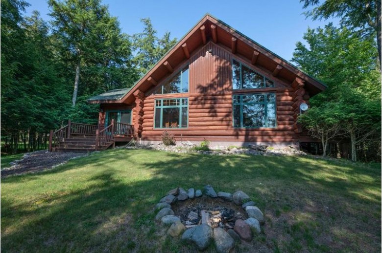 7920 Sanctuary Dr, Sugar Camp, WI by Re/Max Property Pros $899,500