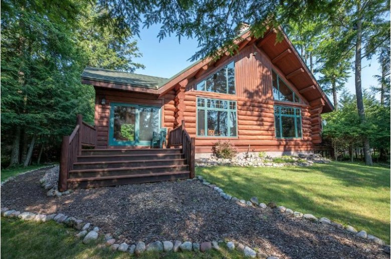 7920 Sanctuary Dr, Sugar Camp, WI by Re/Max Property Pros $899,500