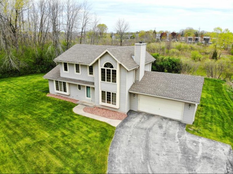 10038 N Brookdale Dr, Mequon, WI by Rubins Realty, Llc $424,900
