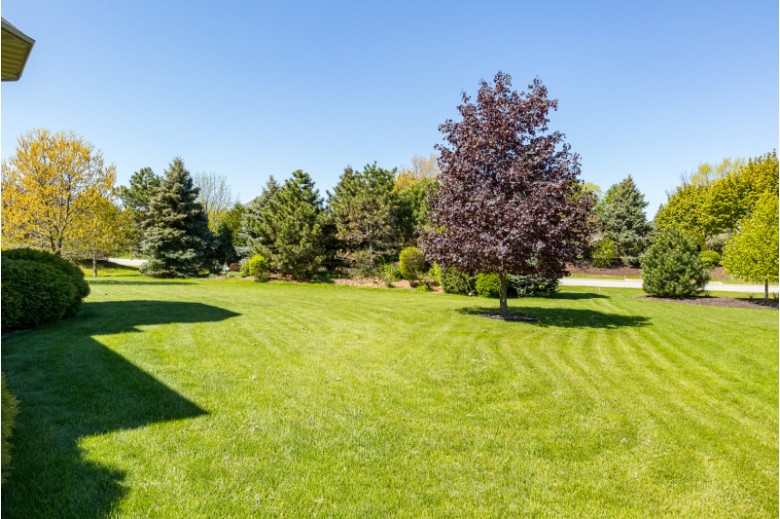 4013 Stonegate Drive Oshkosh, WI 54904-8856 by First Weber Real Estate $695,000