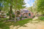 N6573 Shorewood Hills Rd, Lake Mills, WI by First Weber Real Estate $610,000