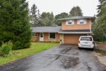 12326 W Grange Ave Hales Corners, WI 53130-1058 by First Weber Real Estate $319,900
