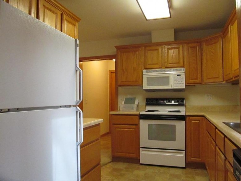 7220 Saukdale Dr 13 Madison, WI 53717 by First Weber Real Estate $264,900