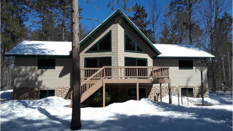 5664 Breezy Pine Rd, Sugar Camp, WI by Coldwell Banker Mulleady-Rhldr $385,900