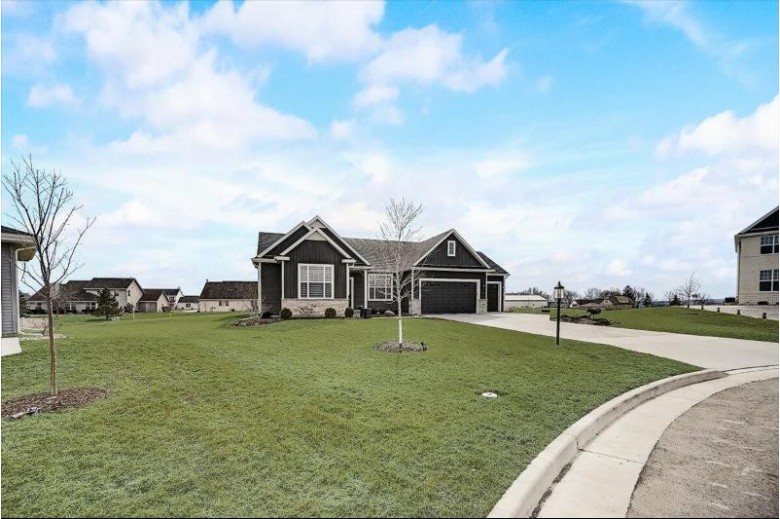 4819 W Bear Claw Ct Franklin, WI 53132 by Powers Realty Group $674,900