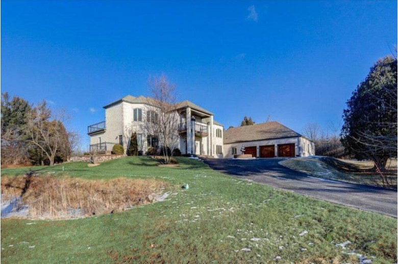 2430 W Dean Ct River Hills, WI 53217 by Redefined Realty Advisors Llc $925,000