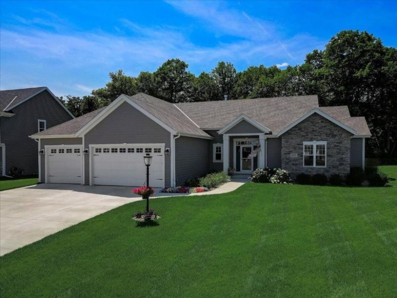 W224N4557 Seven Oaks Dr, Pewaukee, WI by First Weber Real Estate $739,900